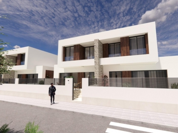 Urbanización moderna en Dolores de 8 chalets semi-adosados.