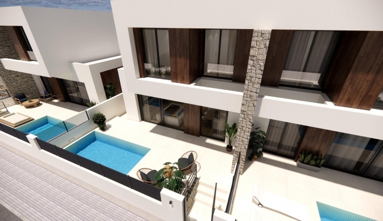 Urbanización moderna en Dolores de 8 chalets semi-adosados.