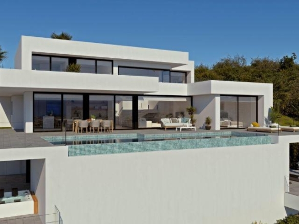 Villa de lujo de 4 dormitorios con piscina infinity y vistas al mar a la venta en Benitachell
