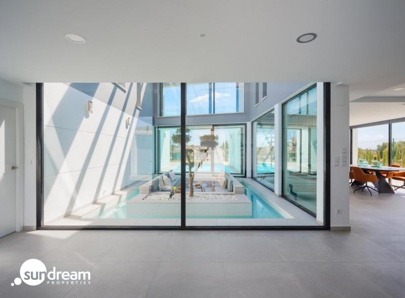 Espectacular villa de 4 dormitorios con parcela de 1000m2 en exclusivo resort de golf(Murcia)